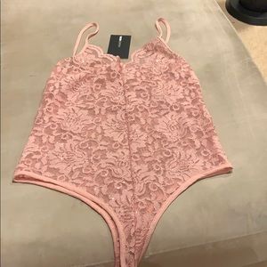 Pink sparkles and lace bodysuit